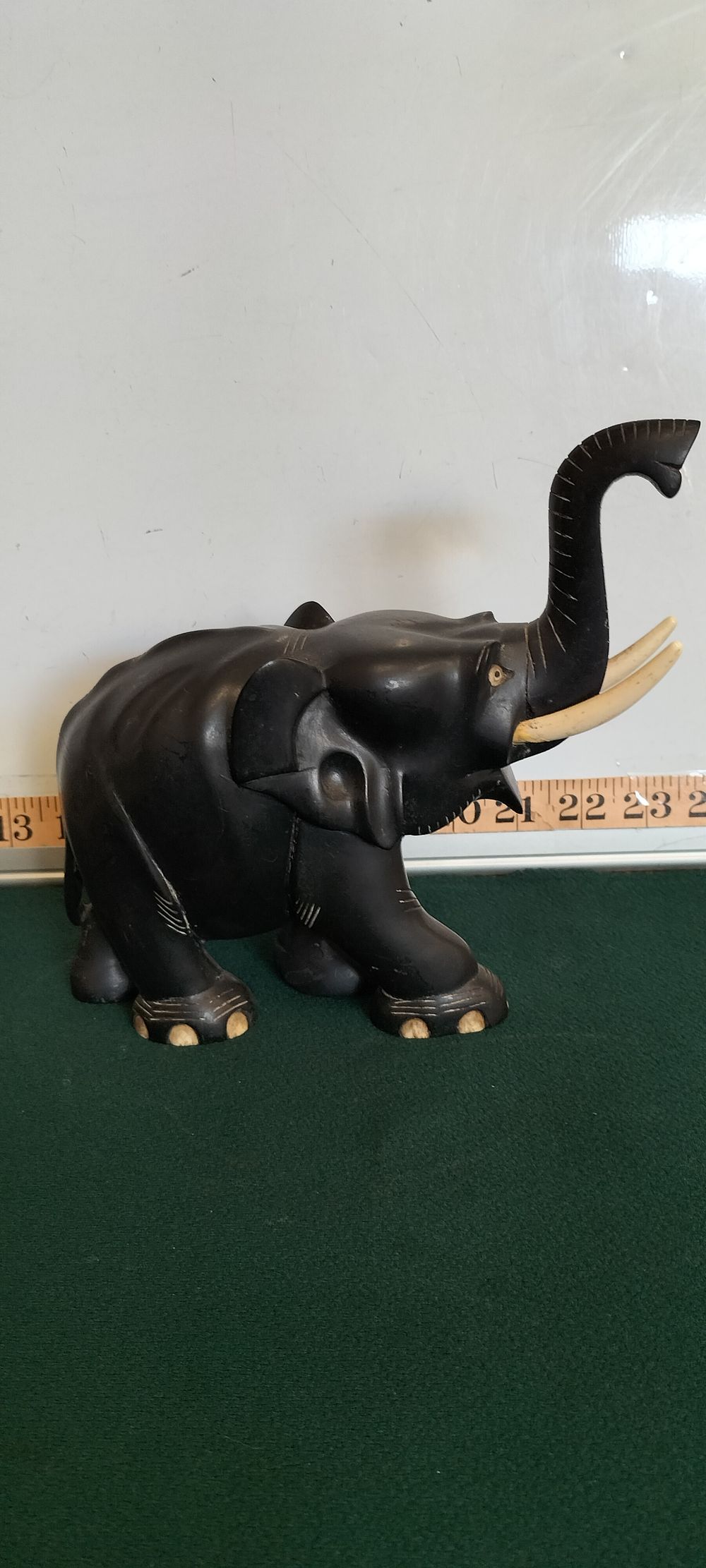 Lot 28 – An Ebony Hand Carved Standing Elephant Figurine