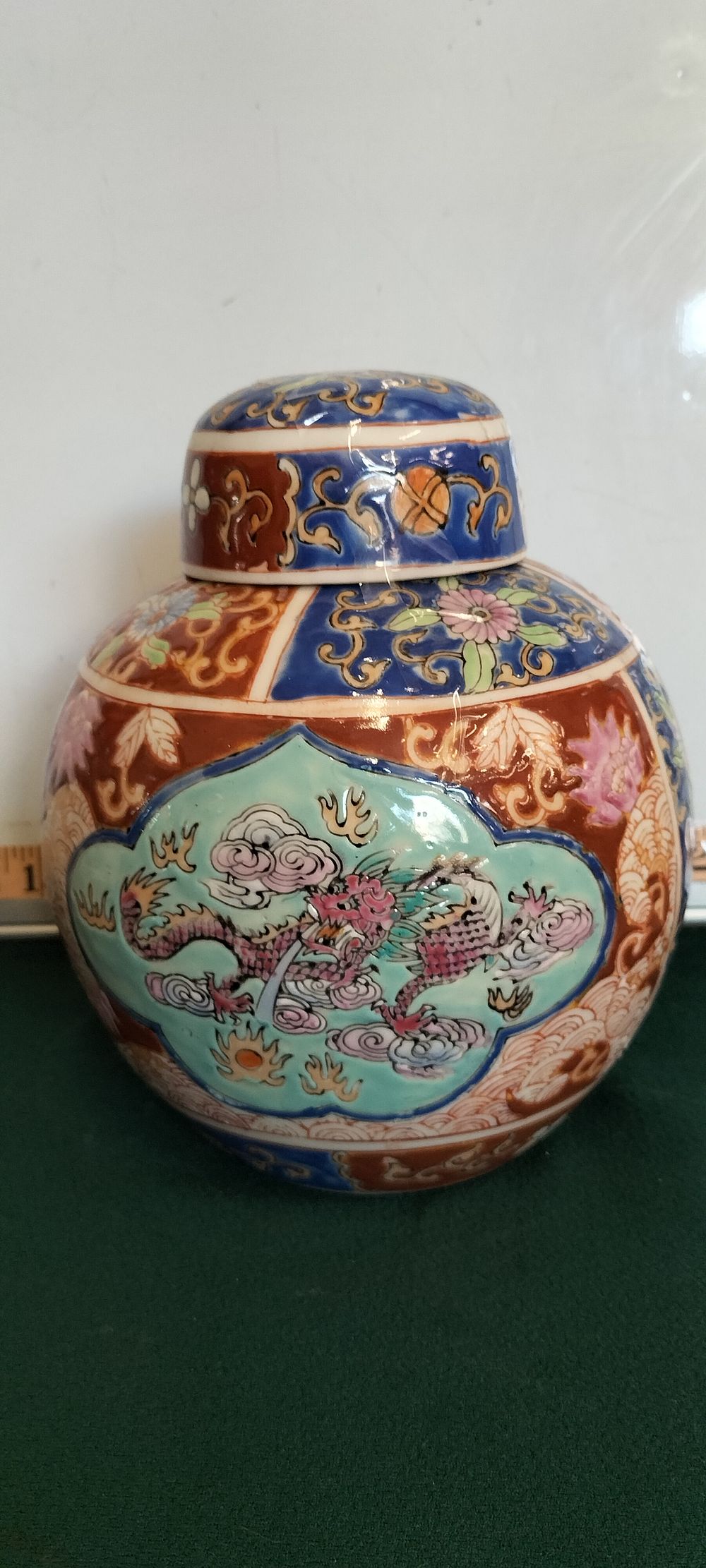 Lot 29 – A Famille Rose Dragon Motif Ginger Jar and Cover