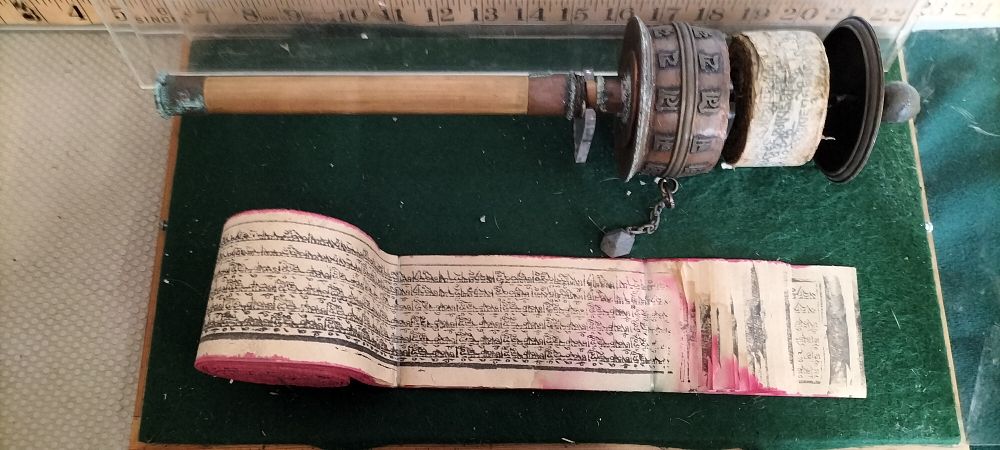 Lot 42 – A Large Tibetan Copper and Wood Handheld Prayer Wheel