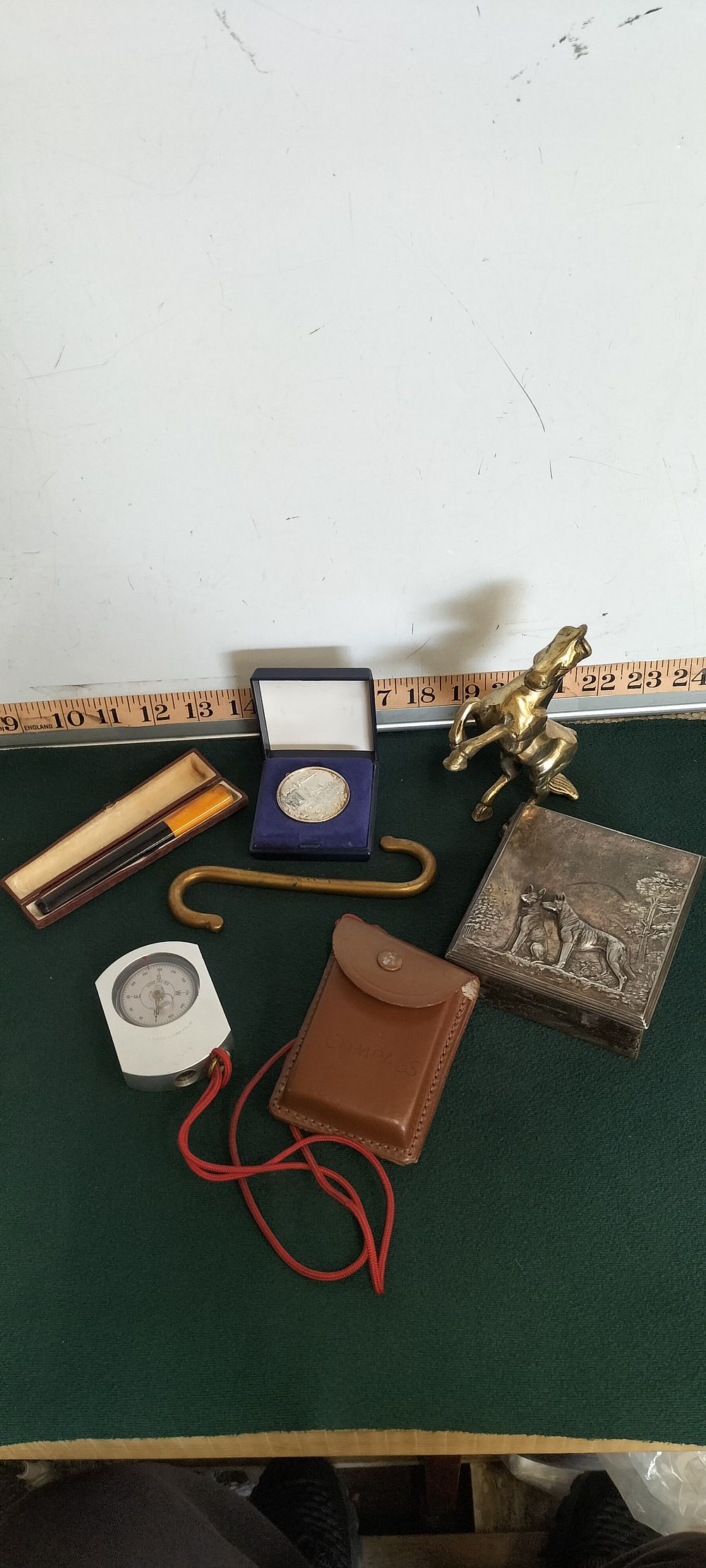 Lot 57 – A Suunto KB-14 Compass and a Collection of Brass and Silver Items