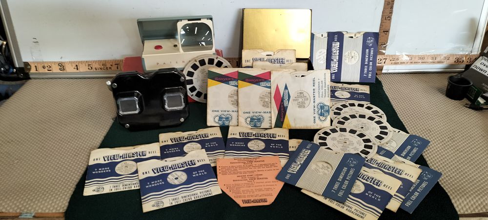 Lot 61 – A Bakelite View-Master Model C Stereoscope and Paterson 35mm Viewer Collection