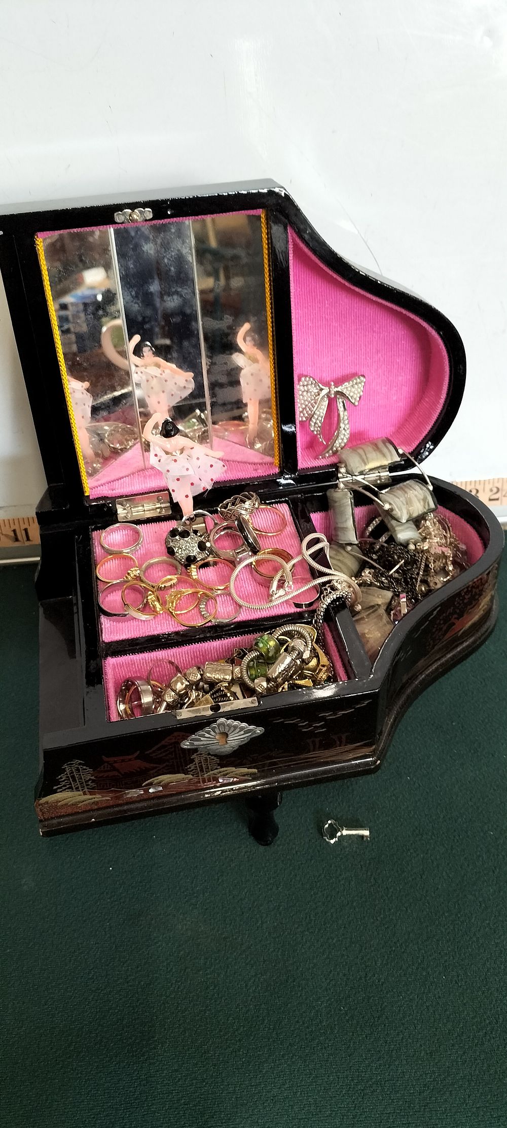 Lot 66 – A Japanese Black Lacquer Musical Piano Jewelry Box and Assorted Jewelry