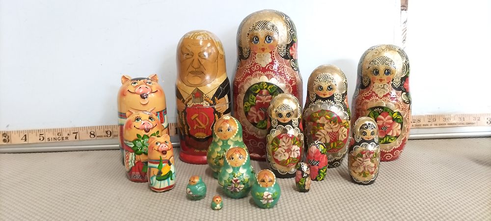 Lot 79 – A Collection of Wooden Sergiyev Posad and Folk Character Nesting Dolls