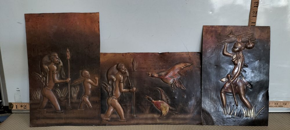 Lot 80 – A Trio Of Copper Relief African Hunting And Domestic Scenes
