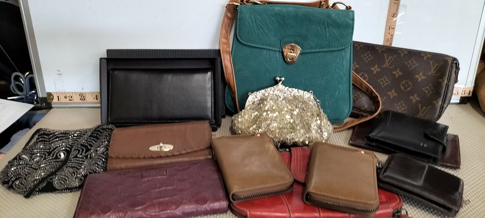 Lot 82 – A Collection of Leather Handbags Wallets and Evening Purses