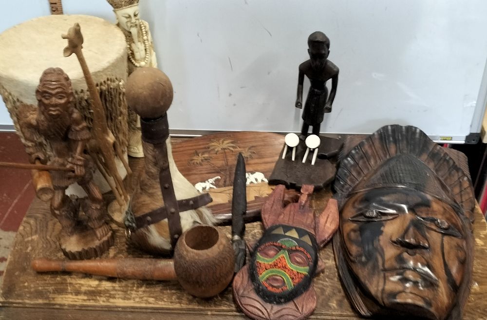 Lot 100 – A Group of Sub-Saharan African Style Wood and Mixed Media Decorative Objects