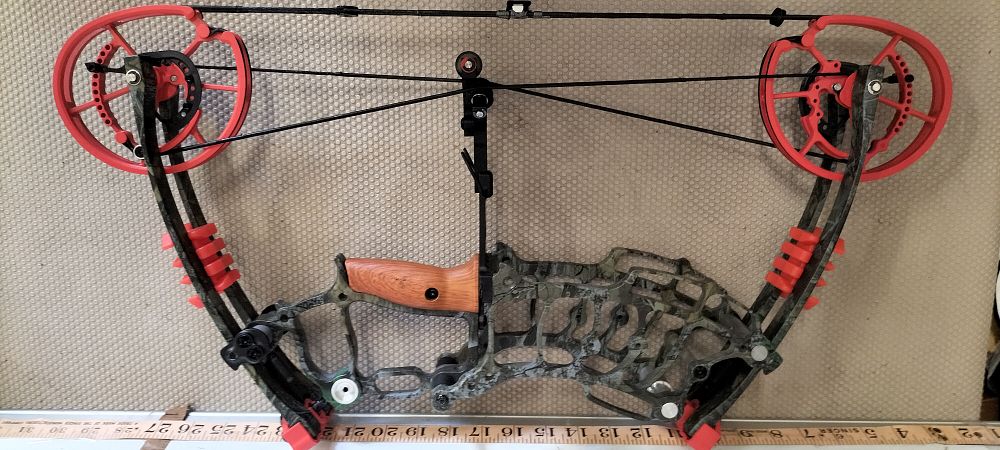 Lot 121 – A Camouflage Dual Cam Compound Archery Bow