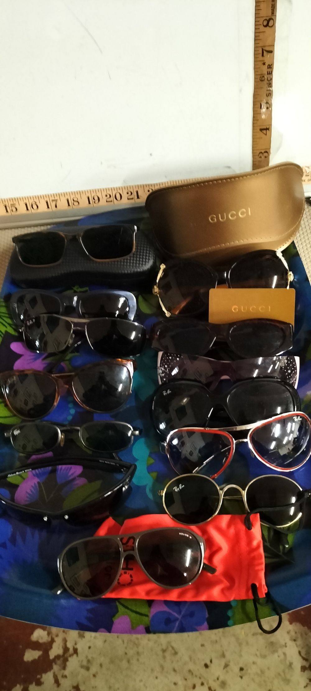 Lot 127 – An Assortment of Gucci Ray-Ban Lacoste and Police Sunglasses