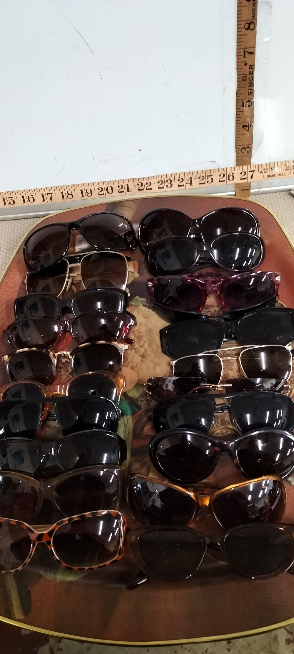 Lot 128 – An Assortment of Eighteen Plastic and Metal Fashion Sunglasses