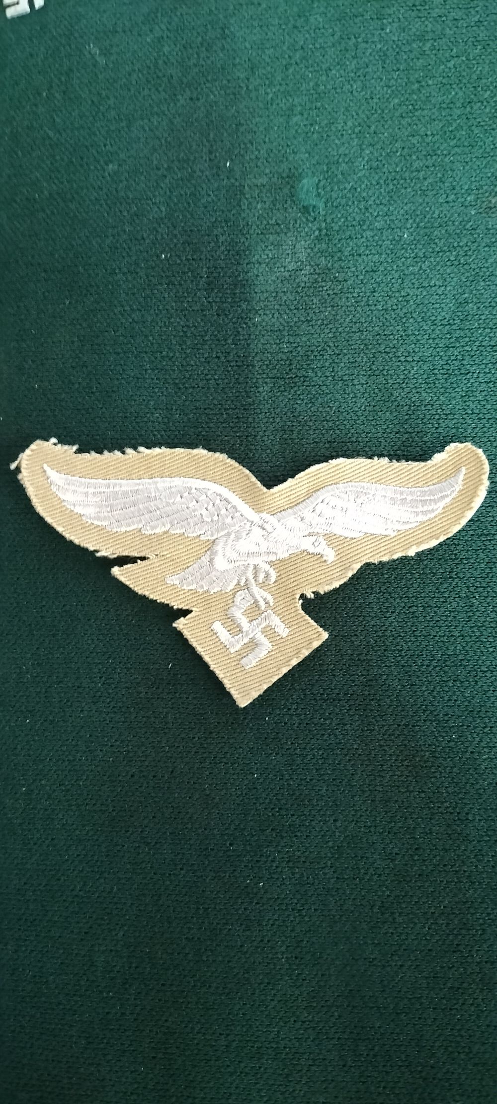 Lot 138 – A Luftwaffe Tropical Uniform Embroidered Breast Eagle