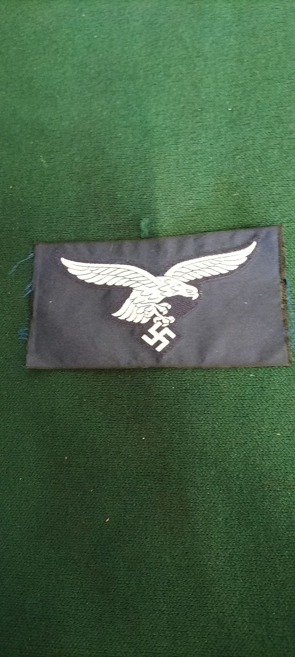 Lot 144 – A Luftwaffe Machine Embroidered Uniform Breast Eagle
