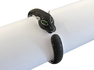 Sterling Silver Black Panther Bracelet with Green Eyes. Hinged bangle in like new condition 