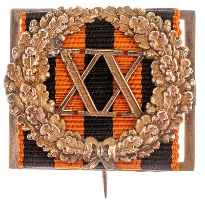 Знак отличия за 20 лет беспорочной службы для военного чиновника. Учрежден 22 августа 1827 г в 