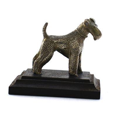 Статуэтка — миниатюра &laquo;Терьер&raquo;. Серебро 800 пробы, бук. 
Общий вес - 57,1 гр., высота - 4,4 см 