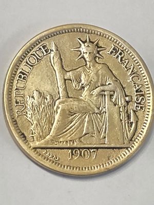 מטבע כסף בערך 1 פיאסטר הודו-סין הצרפתית 
שנת 1907 כסף 900 קוטר 29 מ"מ 
משקל כולל 