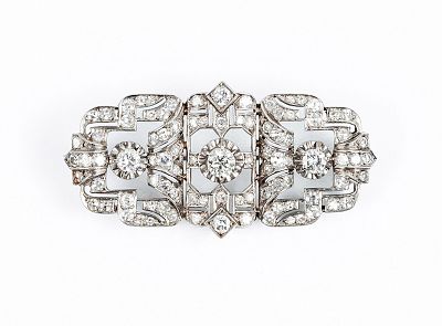 Bello alfiler antiguo, estilo 'art-decó', en sólida montura de platino, en plaqueta 