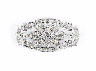 Bello alfiler antiguo, estilo 'art-decó', en sólida montura de oro blanco 18 K, en plaqueta 