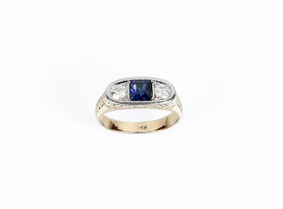 Anillo tresillo vintage en sólida montura de oro amarillo 18 K, con piedra azul central, talla 