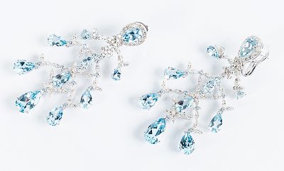 Bellos pendientes largos en cascada articulada de aguamarinas, talla perilla (tratadas) y 