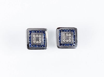 Pendientes en oro blanco 18 K. con motivo cuadrangular con doble orla en bandas de limpios y 