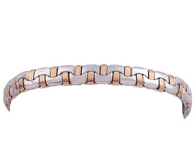 PULSERA EN ORO BICOLOR 18KT. Pulsera realizada en oro bicolor de 18kt con eslabones planos 