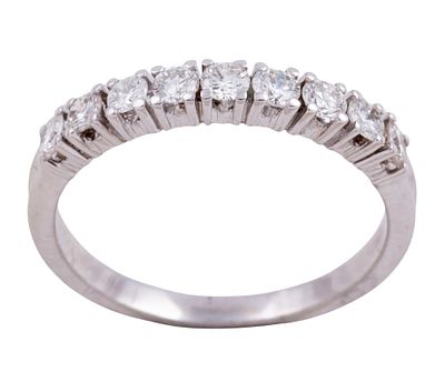 MEDIA ALIANZA EN ORO 18KT Y DIAMANTES. Media alianza realizada en oro de 18kt. Adornada por 9 