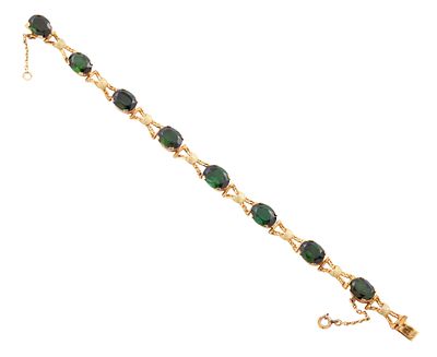 PULSERA EN ORO 16KT Y TSAVORITAS. Pulsera realizada en oro de 16kt. Compuesta por granates 