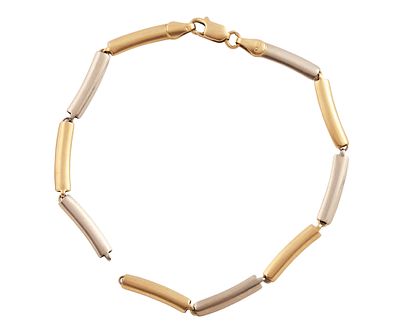PULSERA EN ORO BICOLOR 18KT. Pulsera realizada en oro bicolor de 18kt con eslabones planos. 