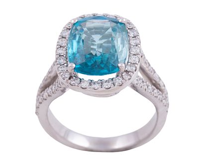 SORTIJA EN ORO 18KT, ZIRC&Oacute;N Y BRILLANTES. Sortija realizada en oro de 18kt. Zirc&oacute;n natural 