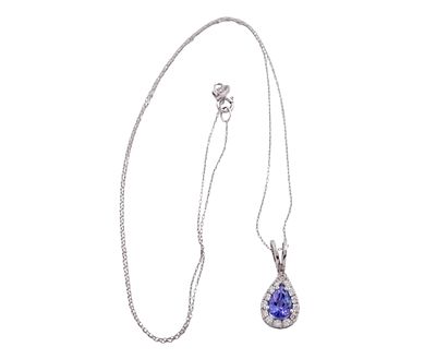 COLGANTE Y CADENA EN ORO 18KT, TANZANITA Y BRILLANTES. Colgante y cadena realizados en oro de 