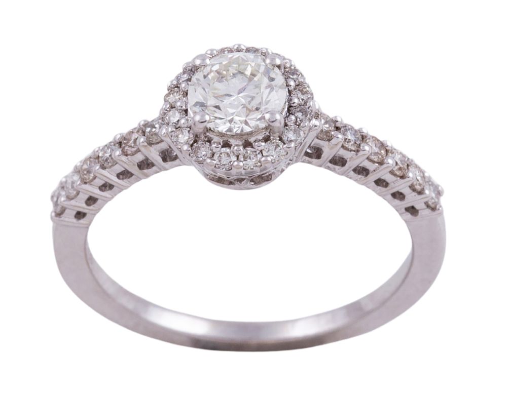 SORTIJA EN ORO 18KT Y BRILLANTES. Sortija realizada en oro de 18kt. Adornada con diamantes en 