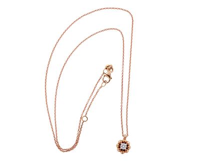 COLGANTE Y CADENA EN ORO 18KT CON BRILLANTE. Colgante y cadena realizados en oro rosado de 18kt. 