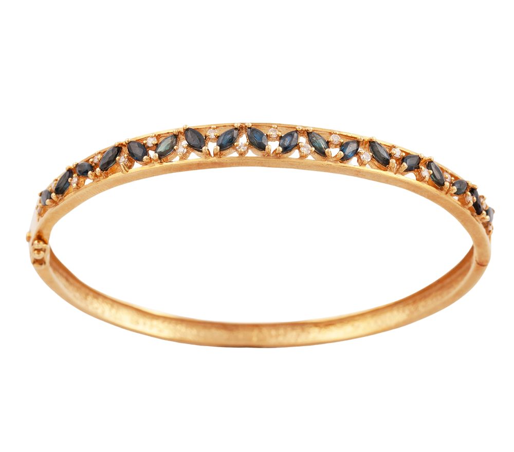 PULSERA RIGIDA EN ORO MACIZO DE 18KT, ZAFIROS Y DIAMANTES. Pulsera r&iacute;gida realizada en oro 