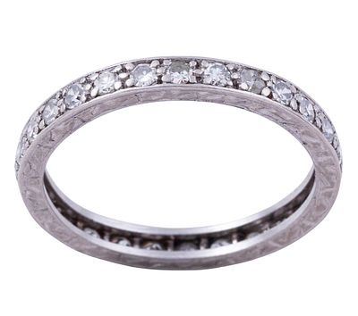 SORTIJA "INFINITY" EN ORO DE 18 KT Y DIAMANTES. Sortija "infinity" realizada en oro de 18 kt. 