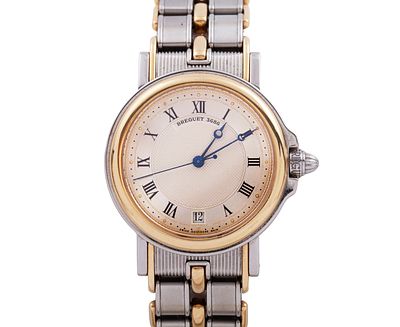 Reloj Breguet modelo Marine 3400SA/12/X90 con caja y correa realizadas en oro y acero. Bisel 