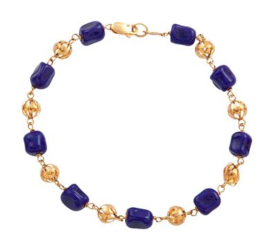 PULSERA EN ORO DE 18KT Y LAPISL&Aacute;ZULI. Pulsera realizada en oro de 18kt con eslab&oacute;n esf&eacute;rico y 