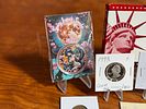 COLLECTIBLE COIN ASSORTMENT. This lot features an assortment of collectible coins including a Image - 3