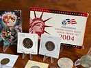 COLLECTIBLE COIN ASSORTMENT. This lot features an assortment of collectible coins including a Image - 1