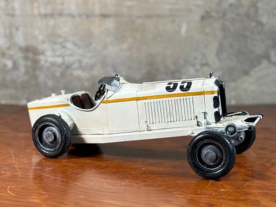 HAND PAINTED METAL MODEL CAR, "THE HILL CLIMBER". This lot features a hand painted metal model 