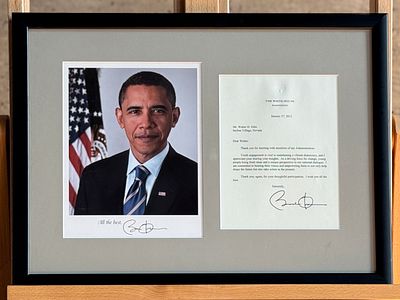 BARACK OBAMA SIGNED PHOTOGRAPH & LETTER. This lot features a professionally framed signed photo 