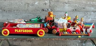 ANTIQUE TOY COLLECTION. This lot features a large collection of antique toys in various 