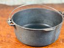 WAGNER WARE CAST IRON DUTCH OVEN. This lot features an antique cast iron dutch oven by Wagner Image - 1