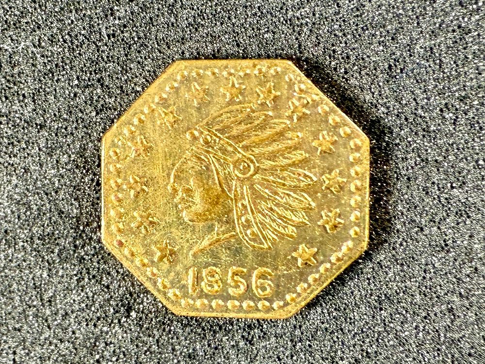 1856 CALIFORNIA FRACTIONAL GOLD COIN. This lot features a 1856 California fractional gold coin 