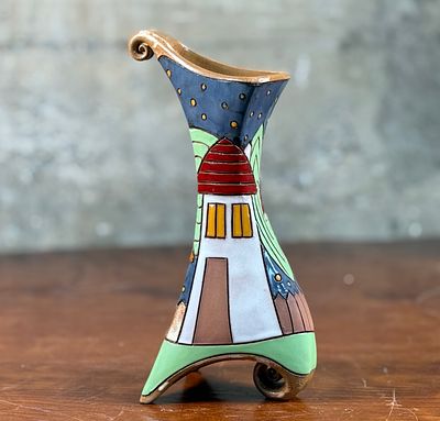 GAPPA HANDMADE POTTERY VASE. This lot features a stunning handmade flower pottery vase by Gappa 