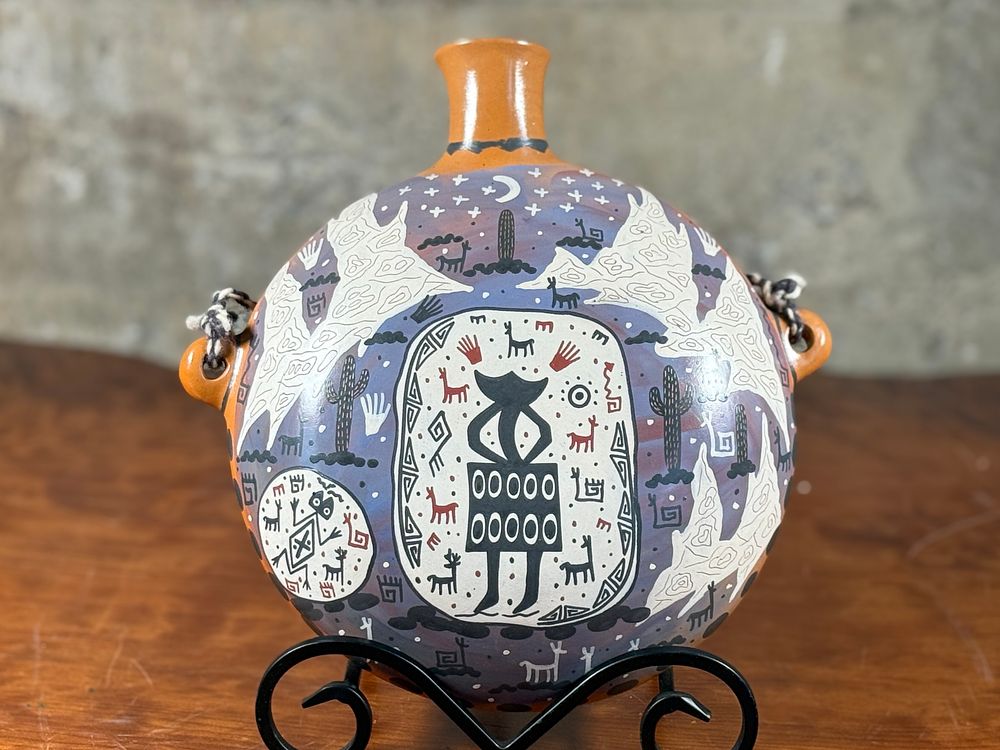 ALVARO COFOYOTE, PUEBLO CANTEEN. This lot features a stunning Pueblo canteen, signed by artist 