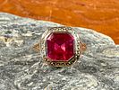 10K GOLD RING. This lot features an antique 10k gold ring with what appears to be a large Ruby Image - 1