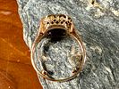 10K GOLD RING. This lot features an antique 10k gold ring with what appears to be a large Ruby Image - 5