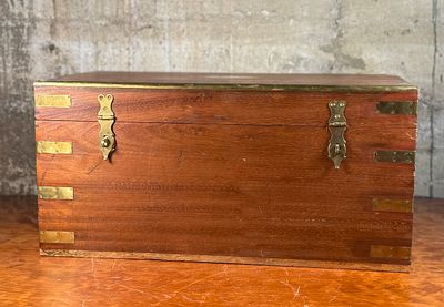 ANTIQUE CEDAR CHEST WITH RIVETED BRASS BANDING. This lot features a stunning antique cedar chest