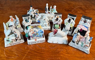 PORCELAIN "FAIRING" TRINKETS. This lot features a collection of antique porcelain "fairing" 