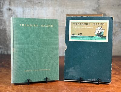ROBERT LOUIS STEVENSON, "TREASURE ISLAND". This lot features a 1930 boxed set of "Treasure 